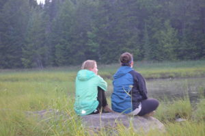 Sitting by pond